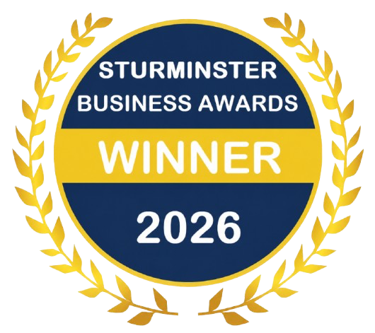 Petersham Cottage Candles Sturminster Business Awards Winner 2026 badge with a blue and gold circular design and gold laurel wreath.
