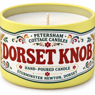 Dorset Knob scented candle in a yellow tin